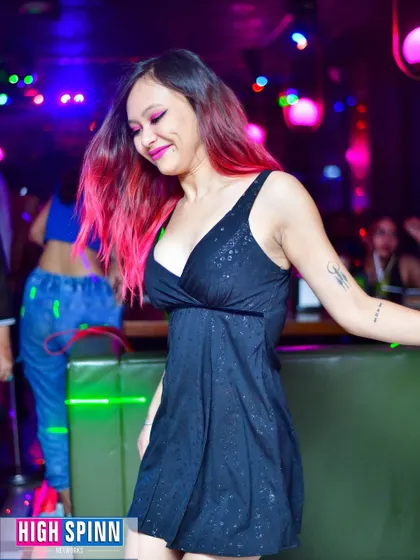 A guest dancing and feeling the music at Drava. The dance floor is always the main attraction.