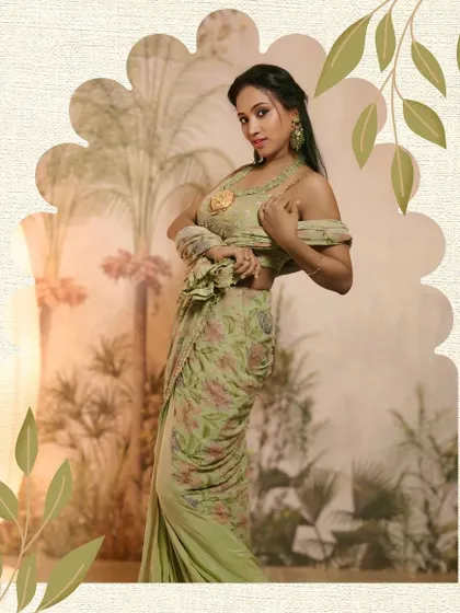 A modern floral print pre-draped saree in a soft sage green. The off-shoulder styling gives it a contemporary edge.