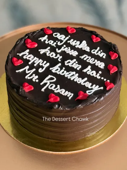A custom Dutch Chocolate cake with a fun, romantic message written in Hindi.