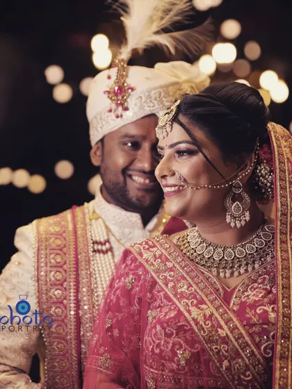 A beautiful close-up candid of the couple, with soft background lighting creating a romantic and intimate feel.