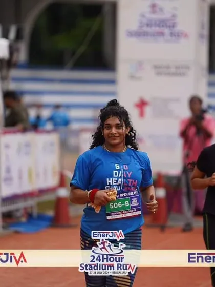 Crossing the finish line with a smile. This event taught me that willpower can take you any distance, and I couldn't have done it without my running group.