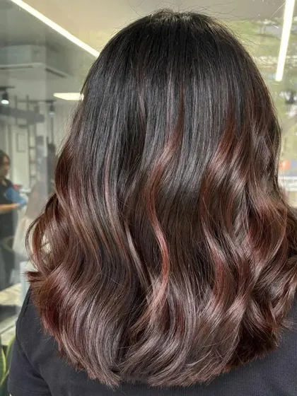A side view of the reddish-brown highlights, showing how they add warmth and dimension.