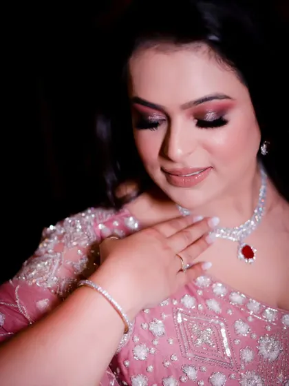 A close-up portrait of the bride-to-be on her engagement day. Her soft makeup and elegant diamond jewellery are beautifully highlighted in this shot.