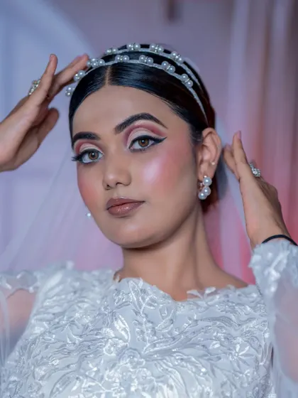 Another angle of the Christian bridal makeup, showing the beautiful blend of colors on the eyelid and the flawless finish of the skin.