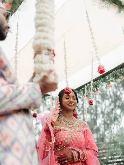 The bride's anticipation as the groom approaches during the ceremony. We capture the story from different perspectives to create a complete narrative.
