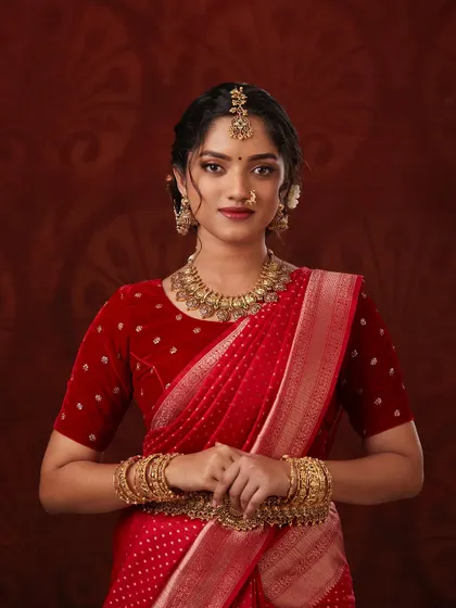 A classic portrait of the model looking directly at the camera, showcasing the full beauty of the set.