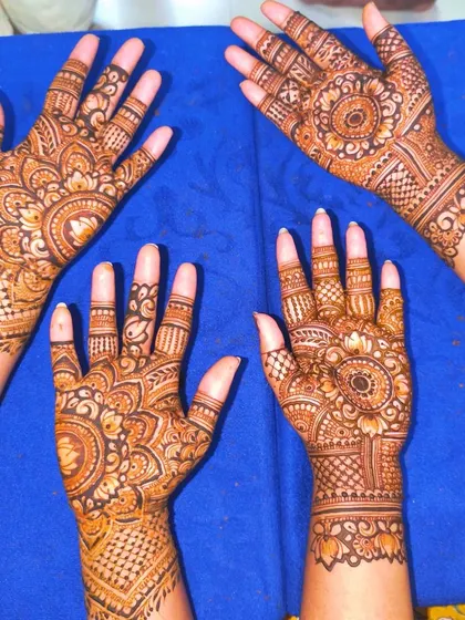 Coordinated mandala designs for the bridesmaids. This is a great way to have a unified look for the bridal party while still giving everyone a unique pattern.