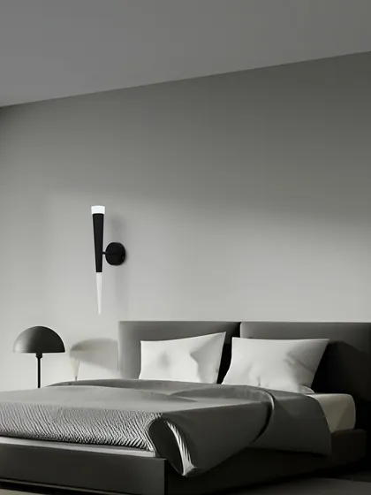 A full bedroom view with the torch sconces, showing how they can elevate the entire space.