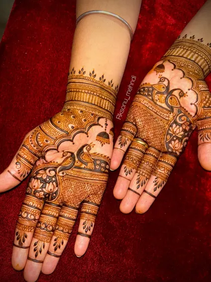 This gallery showcases a variety of my traditional designs. You'll find classic elements like peacocks, elephants, lotuses, and intricate jaali (net) patterns, all expertly crafted to create timeless beauty.