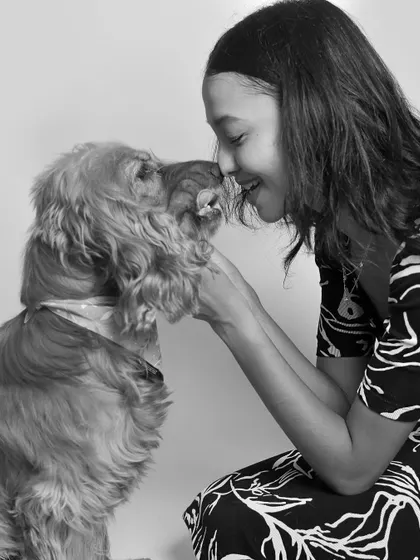 Nose-to-nose kisses are the best. This close-up shot in black and white feels incredibly personal and highlights the deep affection in this relationship.