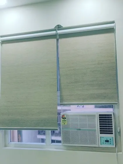 Another example of fabric roller blinds, which are a practical solution for covering windows of any size. I ensure they are measured and fitted correctly for smooth operation.