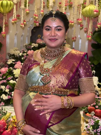 It was a joy to get this beautiful mom-to-be ready for her Seemantha ceremony. The makeup is traditional and radiant, designed to make her feel special and comfortable while highlighting her natural glow during this wonderful celebration.