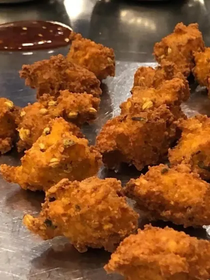 A plate of our crispy Moong Dal Vadas, served with traditional chutneys, a popular Rajasthani snack.