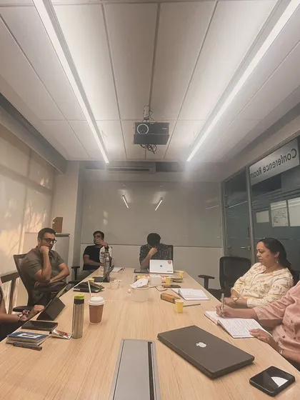 Leopards in session. A candid shot of the group in deep discussion, creating the kind of community where ideas can flourish.