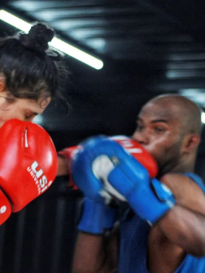 A close up of a punch connecting during a light spar. This is how we sharpen our skills.
