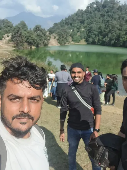 A group photo by the serene Deoriatal lake during our Diwali trip.