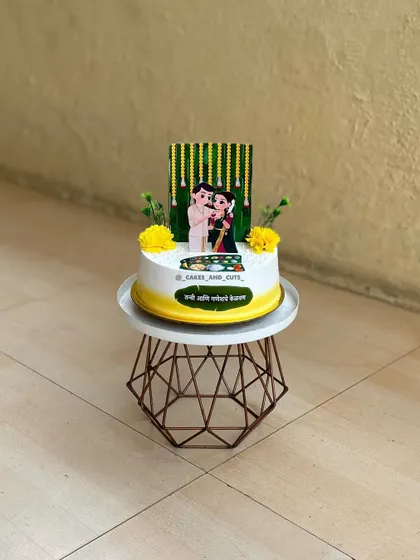 A full view of our custom Kelvan cake, designed to celebrate the couple's pre-wedding ceremony with traditional motifs.