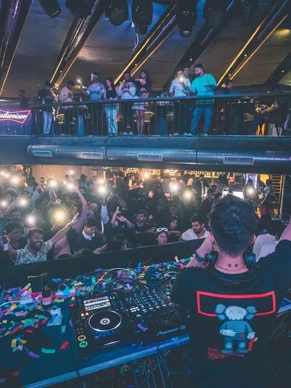 A sea of lights from the crowd, seen from my perspective at the DJ booth. Moments like these during a slow jam create a truly magical and intimate atmosphere, perfect for wedding cocktail nights.