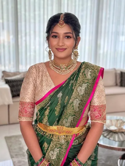 Nikhila's sweet and charming personality shines through with this soft, traditional look. The makeup is fresh, with a focus on glowing skin.