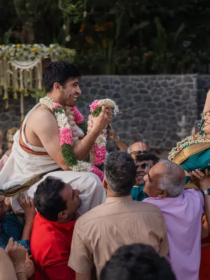 A playful moment during a Tamil wedding ritual. The joy and laughter shared between the couple are what make these candid shots so special and memorable.
