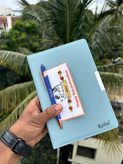 Here is the Orion diary set in a lovely pastel blue. It's a great choice for a brother who appreciates subtle colors and personalized stationery for Rakhi.