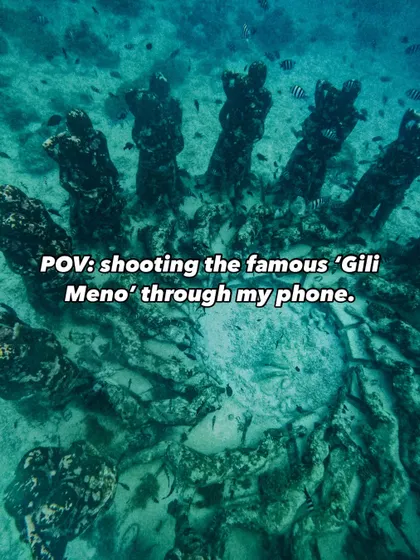 A point-of-view shot of me capturing the famous Gili Meno underwater statues with just my phone.