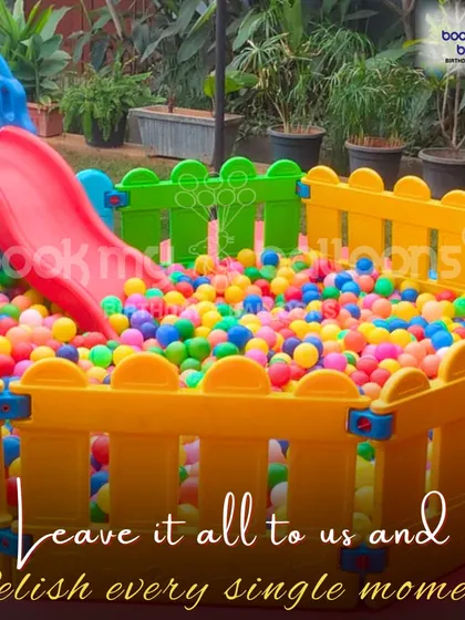 My service includes setting up complete play areas. This image shows a ball pit with a slide, creating a mini playground that keeps the little ones happy and engaged.