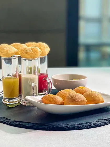 Puchka, gol gappa, pani puri. One dish, many names. Our version pays ode to this diversity with five different flavoured waters, allowing you to experience a spectrum of tastes.