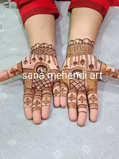 A unique design with yin-yang symbols, swastikas, and jhumka motifs.