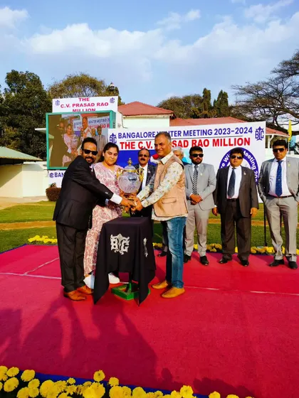 The C.V. Prasad Rao Million trophy is presented to the winning connections of Excellent Lass.