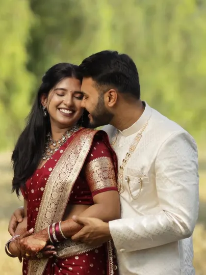 That beautiful, in-between moment of pure happiness. For this engagement shoot, we went with a soft, natural look that let the bride's joyful smile be the main focus.
