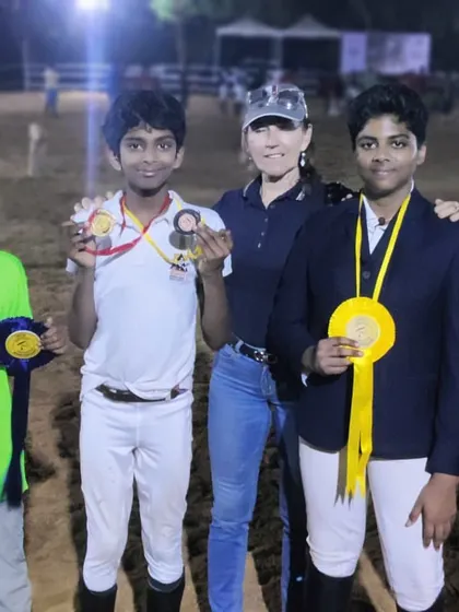 Our young riders proudly display their medals after qualifying at the Pondy Show. We are thrilled to see them achieve success in their very first competition.