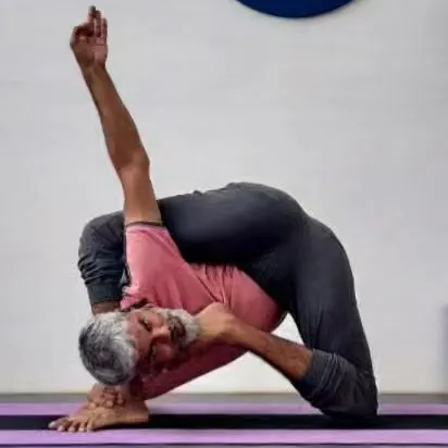 Krishnasana, named after Lord Krishna, is a deep and complex posture that combines a hip opener, a twist, and a balance. It requires significant flexibility in the hips and spine.