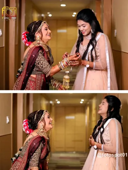 A candid moment of shared laughter between the bride and her sister or best friend. These are the unscripted memories that make a wedding album special.