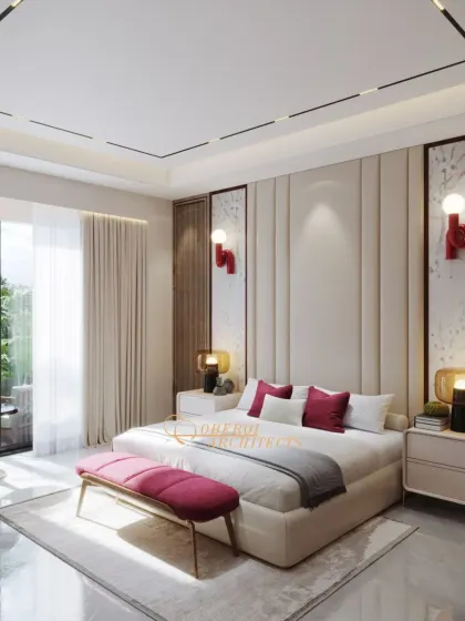 This bedroom design balances a calm, creamy palette with bold berry-toned accents in the bench and pillows, creating a space that is both serene and stylish.