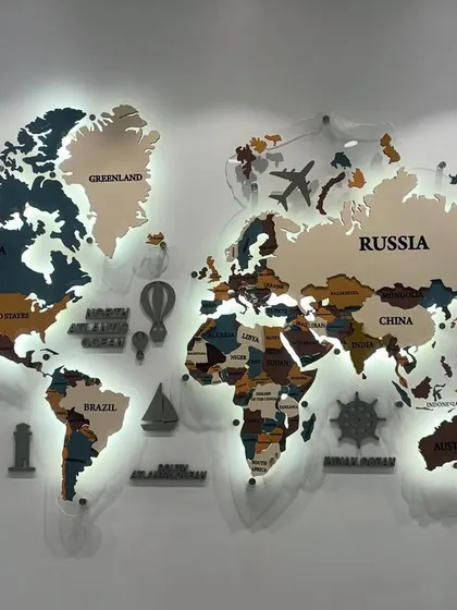 Another shot of the illuminated world map, demonstrating its powerful effect as a piece of ambient, decorative art.