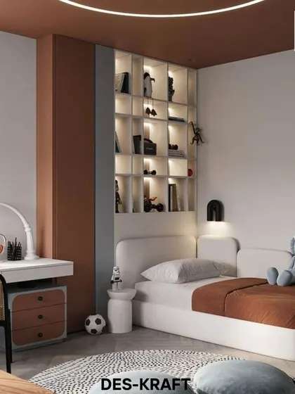 This view highlights the built-in, backlit bookshelf that doubles as a headboard, providing a perfect spot for bedtime stories and favorite toys.