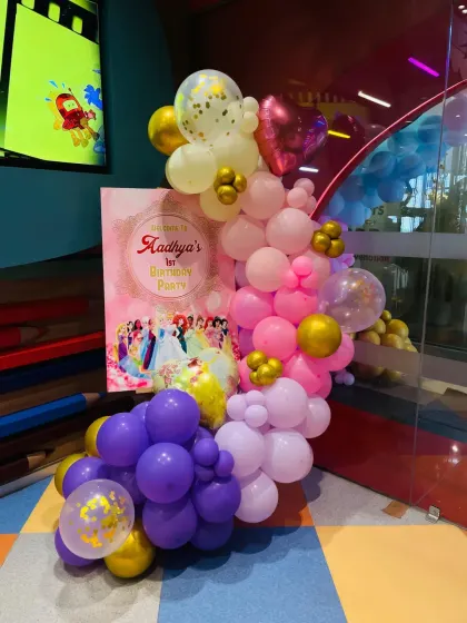 Every detail matters for a first birthday. For Aadhya's princess-themed party, we created this beautiful welcome sign and balloon arrangement to greet guests as they arrived.