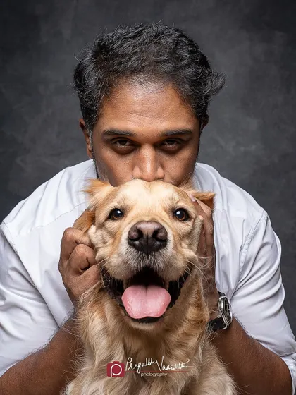 That happy face says it all. A studio portrait doesn't have to be formal; it can be a place to capture the pure joy and love between you and your pet.