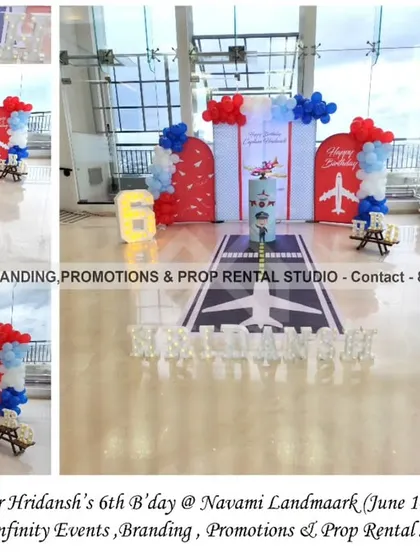 Fly high! We designed this exciting aeroplane theme for a 6th birthday at Navami Landmaark. The setup features a runway floor decal, aeroplane-themed backdrops, and a red, white, and blue color scheme for a little aviator's dream party.