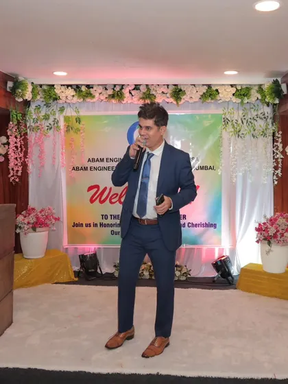 Hosting from the stage at a corporate annual day. The setup was beautiful, and my job was to make sure the energy in the room matched the decor.