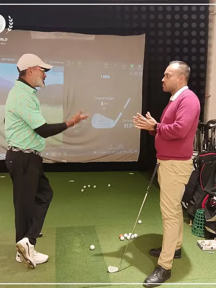 A one-on-one consultation in front of the simulator. I believe in discussing the data and strategy with my clients to ensure they understand the path forward.