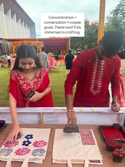 A creative date at a wedding. I love seeing couples get completely immersed in the printing process together, sharing ideas and creating matching tote bags. It's a wonderful way to connect and make a shared memory during the celebration.