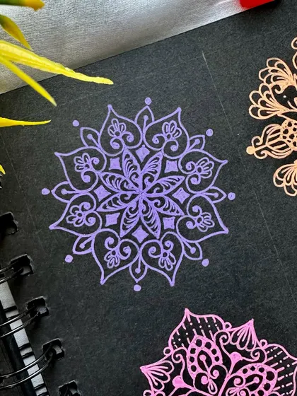 A lovely purple mini mandala, perfect for practicing intricate details.