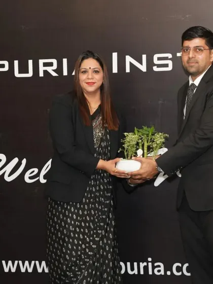 Receiving a token of gratitude from the institute for conducting the seminar. It is a privilege to collaborate with educational institutions that prioritize social and legal awareness.