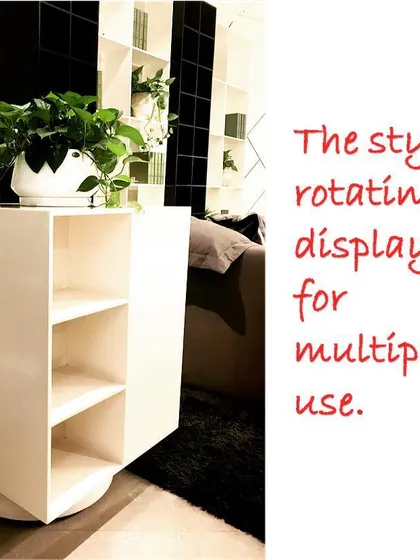 This stylish rotating display unit is a perfect solution for a small corner. Its multi-sided design allows you to display books or decorative items, and it can be turned easily to change the look. It's a smart, multi-purpose piece for modern living.