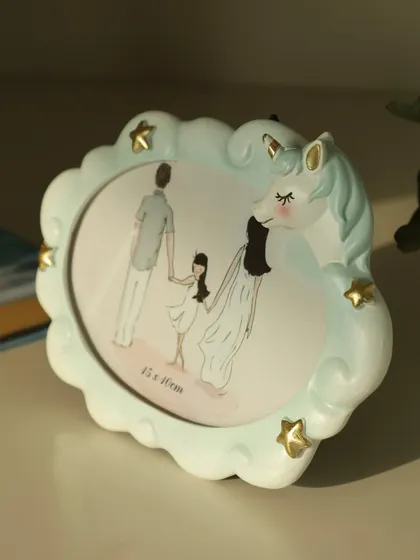 This dreamy unicorn photo frame, with its pastel colors and starry accents, is designed to hold the most magical moments. It adds a touch of enchantment to any child's room.