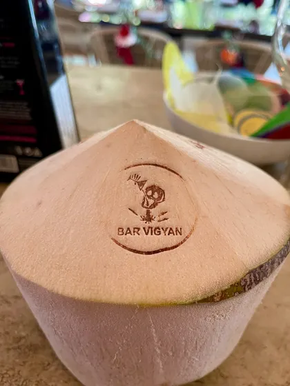 For a destination wedding in Goa, I had my logo branded directly onto fresh coconuts. It's a unique and memorable way to serve welcome drinks that guests will definitely photograph.