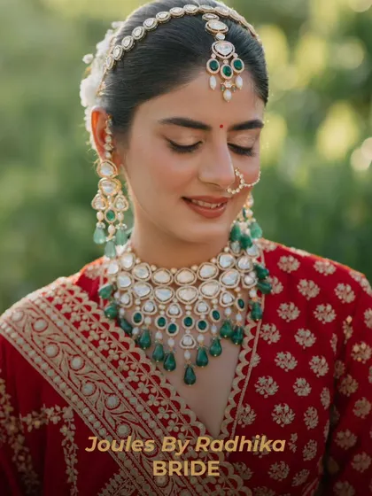 A vision in red and emerald. This is one of my real brides, looking absolutely radiant on her special day. Her bespoke polki and emerald bead necklace set was customized to complement her bridal lehenga and her personal style.