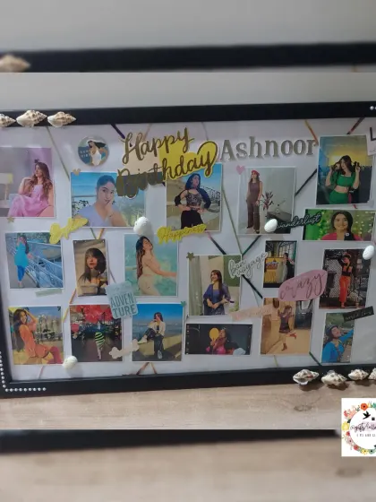 A clear, straight-on shot of the custom birthday frame for Ashnoor Kaur, showcasing the photo collage and travel-inspired details.